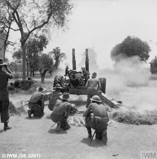 British medium gun firing at the walls of Fort Dufferin, 10th March 1945