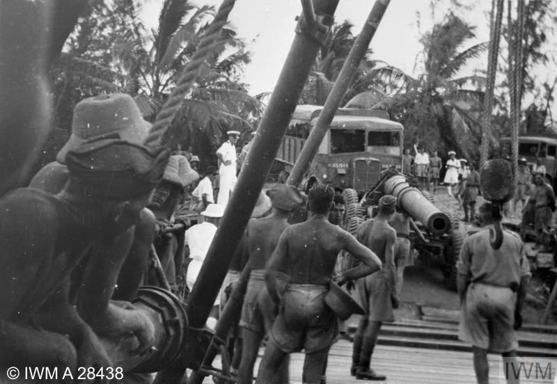 One of the big coastal defence guns arriving on the gun site at Addu Atoll